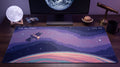 AFK in Orbit pixel art desk mat on a desk at night