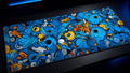 Pop Static desk mat in a dark blue-lit desk setup