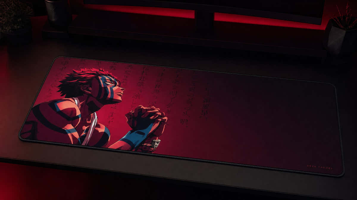 Akaza anime desk mat in a red-black PC setup