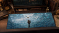 Golden Snitch desk mat in a warm wizard-study desk setup