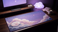 HP Restoring... pixel art desk mat on a desk at night