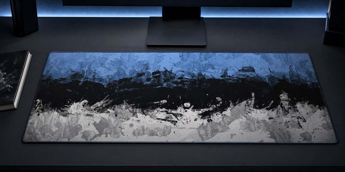 Ink Horizon desk mat in a quiet blue-black PC setup