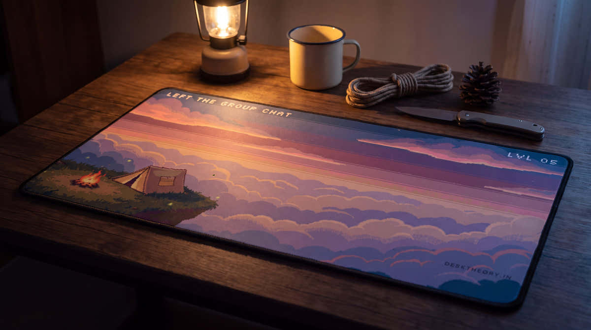 Left the Group Chat pixel art desk mat on a desk at night