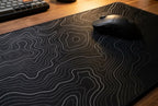 Topographic Black artwork and surface close-up