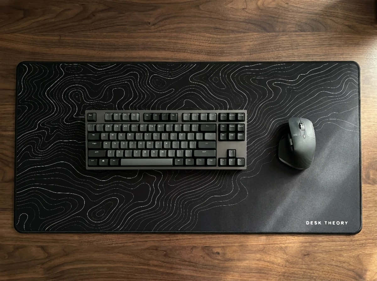 Topographic Black desk mat footprint with keyboard and mouse