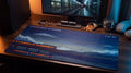 Unskippable Cutscene pixel art desk mat on a desk at night